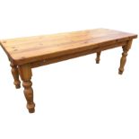 A 7ft rectangular pine kitchen table with thick plank top above a plain frieze, raised on bulbous