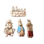 Four solid silver brooches modelled as Beatrix Potter characters, two with enamelled decoration, all