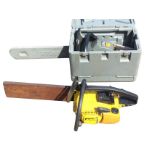 A boxed Ryobi chainsaw; and an Italian Alpinn petrol chain saw. (2)