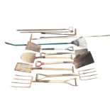 A quantity of garden tools including spades, shovels, rakes, forks, edge shears, etc. (A lot)