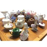 A collection of eleven teapots - handpainted, treacle glazed, floral, etc; and miscellaneous other