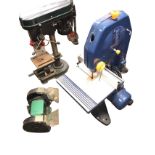 A Powercraft electrical bench bandsaw; a Ferm bench grinder with two wheels; and a Perfomance