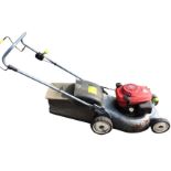A Honda garden mower with petrol engine, complete with grassbox. (A/F)