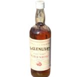 A bottle of George & JG Smith Ltd Glenlivet malt scotch whisky, the 26.6fl oz bottle bottled by