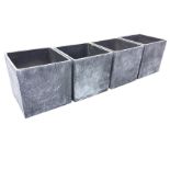 A set of four square faux lead garden tubs - some damage. (27.5in x 17.5in x 18in) (4)