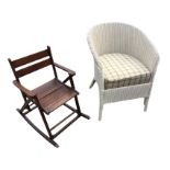 A childs rocking chair with slatted seat - formerly folding; and a Lloyd Loom armchair with