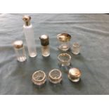 Eight hallmarked silver mounted glass vessels - a pair of salts, dressing table pots with silver