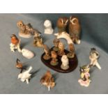 A collection of porcelain, pottery & resin moulded birds - a set of six Royal Doulton owls on stand,
