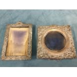 Two late Victorian foliate scroll embossed silver photograph frames, square & rectangular. (6in &