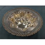 An octagonal moulded Sterling silver bowl, with flat pierced scroll rim - 244g. (9in)