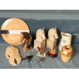 Miscellaneous items including a pair of horse book-ends, a tin jug, a cased carved breadboard, a