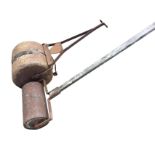 A concrete garden roller with twin drums and iron handle; and a ribbed cast iron roller with wood