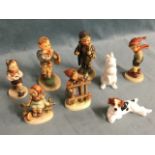 A collection of six C20th Goebel/Hummel children figurines;a Royal Doulton resting dog - HN1101; and