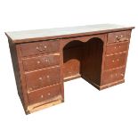 A Victorian painted elm dresser with later rectangular top above a central kneehole with shaped