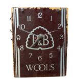 An electric wallclock with glass dial advertising P & B Wools, driven by Smiths movement. (11in x