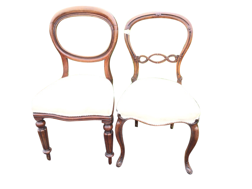 Two Victorian baloonback mahogany dining chairs with stuffover upholstered seats, raised on cabriole