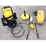 A boxed K2.900M Karcher pressure washer with accessories; and a hand-held small pressure washer. (