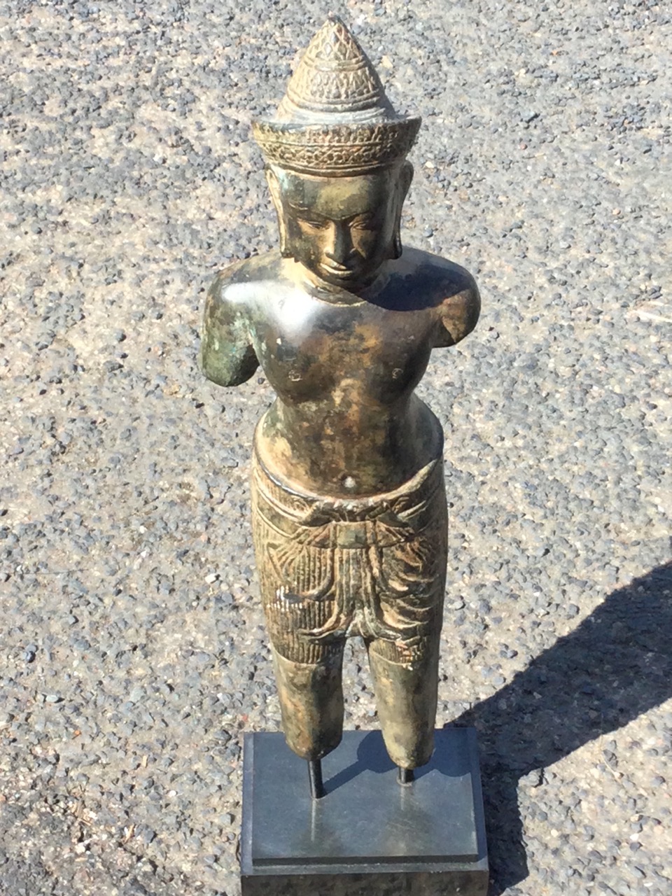 A C12th style Khmer bronze standing male figure, wearing headdress with chignon carved with foliage, - Image 2 of 3