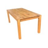 A rectangular oak parquetry dining table, the rectangular top on plain rails, raised on square