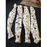 Two pairs of lined floral cotton curtains, printed with purple & blue flowers on white ground. (