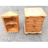 A small pine chest with shaped top above three knobbed drawers on plinth, raised on bun feet; and