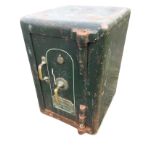 A Victorian cast iron safe by Walker & Worsey Ltd of Birmingham with brass handles to door, having