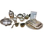 A quantity of silver plate including a four-piece beaded hand engraved teaset, tureens & covers, a