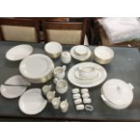 A St Michael white porcelain dinner service decorated in the Lumiere pattern with grey bands and