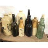 Six nineteenth century glass beer/wine bottles, some diving recoveries; three salt glazed