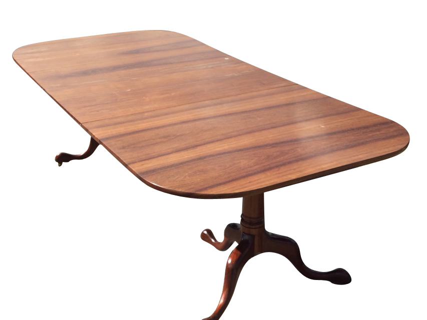 An 8ft reproduction Georgian style walnut dining table by Brights of Nettlebed, the rectangular