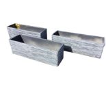 A set of three rectangular faux lead garden planters - some chips. (31in x 10in x 10in) (3)