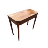 A nineteenth century mahogany turn-over-top tea table, the twin rounded top with ribbed edge