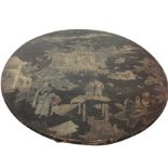 A circular nineteenth century chinoiserie lacquered snap-top occasional table, the top decorated