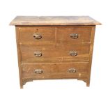 A stained Edwardian oak chest of drawers, with rectangular moulded top above two short and two