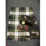 A Clan Gordon heavy tweed Scottish kilt, the lined skirt with leather mounts by David Thomson; and