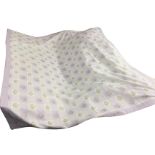 A lilac Laura Ashley cotton quilt woven with square floral grid panels with plain verso. (75in x