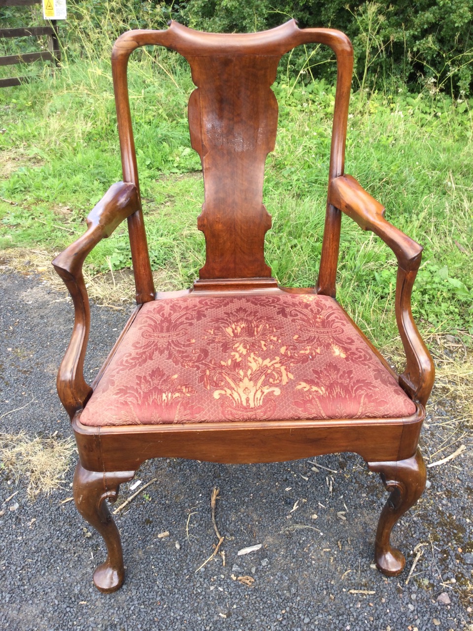 A nineteenth century Queen Anne style walnut armchair with wide shaped splat beneath a scroll carved - Image 2 of 3