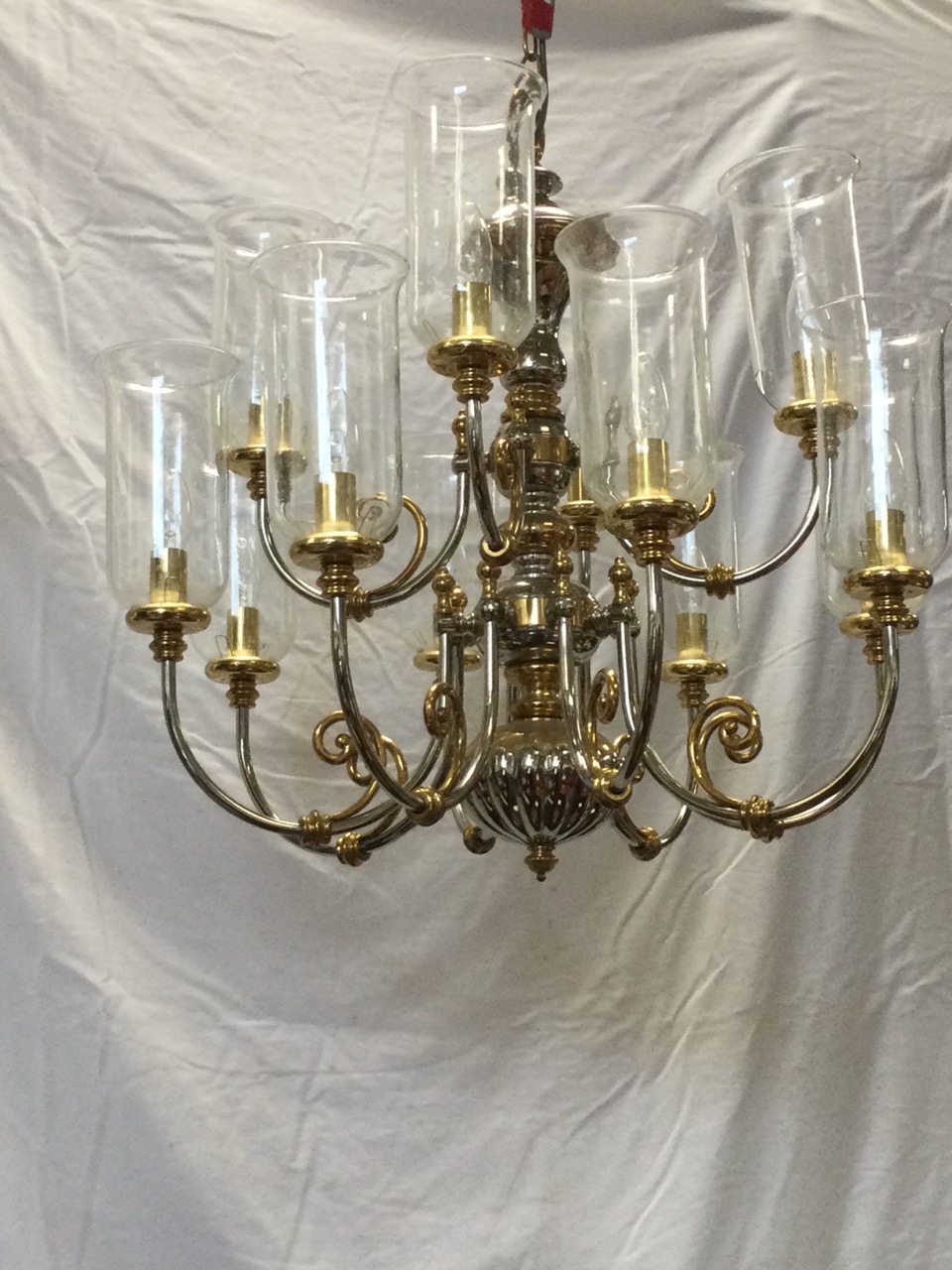 A large Dutch style silvered & gilt brass chandelier, with two tiers of scrolled branches supporting - Image 2 of 3