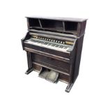 An American harmonium by Mason & Hamlin of Boston with three compartments above a five octave
