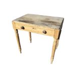 A Victorian pine side table with knobbed frieze drawer, raised on turned legs. (30.75in x 20.75in