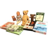 A C20th Chad Valley jointed teddy with glass eyes and canvas pads; a Pedigree composition doll; a