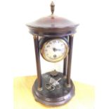 An Edwardian mantle clock with barrel movement having silvered dial under convex glass with brass