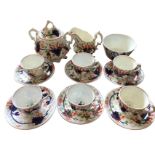 A Victorian gaudy welsh six-piece teaset decorated in the traditional brick red, blue, green and