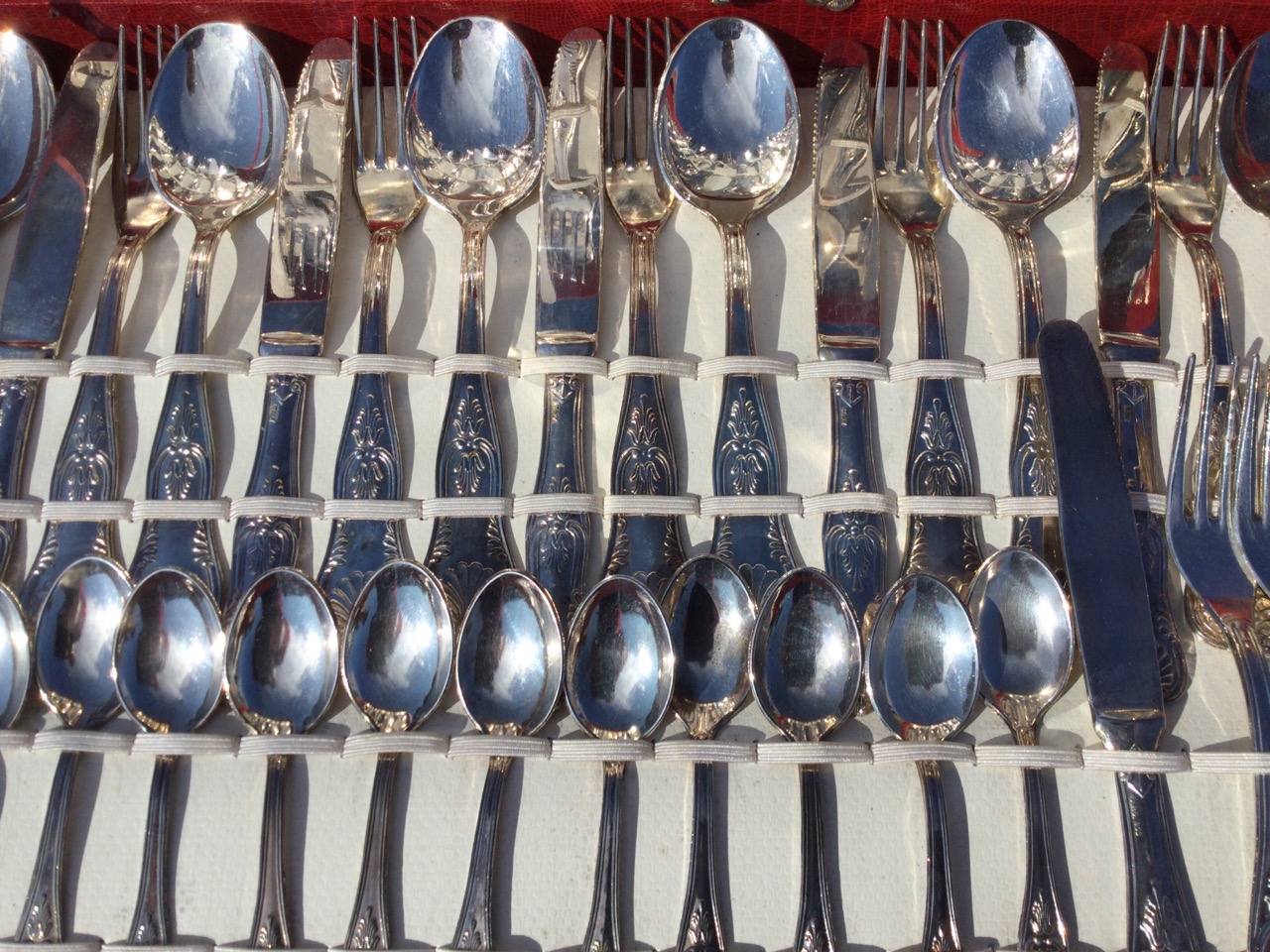 A canteen of Italian silver plated queens pattern cutlery, the handles embossed with shells and - Image 2 of 3