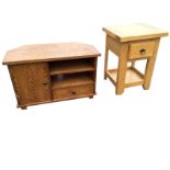 A contemporary oak side table with thick dowelled top above a frieze drawer, raised on rectangular