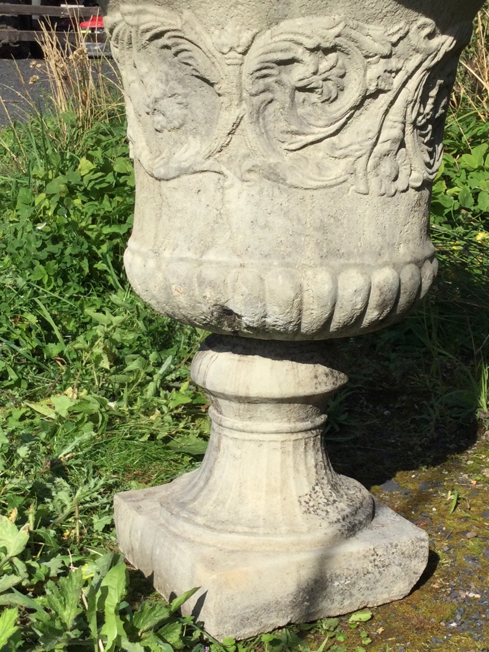 A large composition stone campana style urn, with moulded overhanging egg & dart rim above a waisted - Image 2 of 3