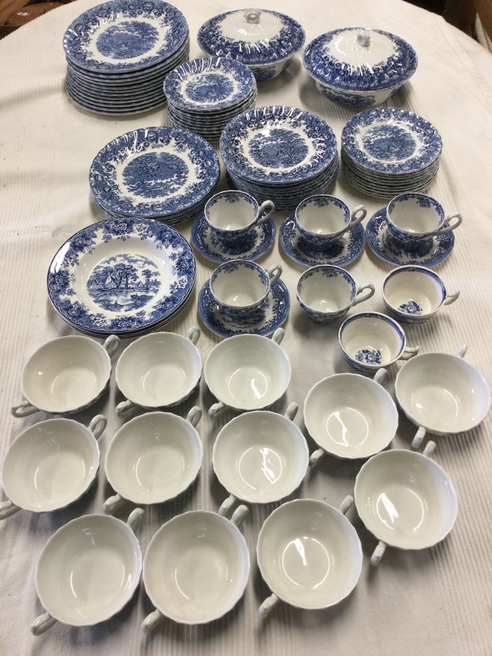 An extensive Alfred Meakin blues & white dinner/tea service decorated in the courtship pattern -