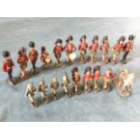 A collection of C20th German Elastolin figures - 12 kilted highlanders, three guardsmen, a horse,