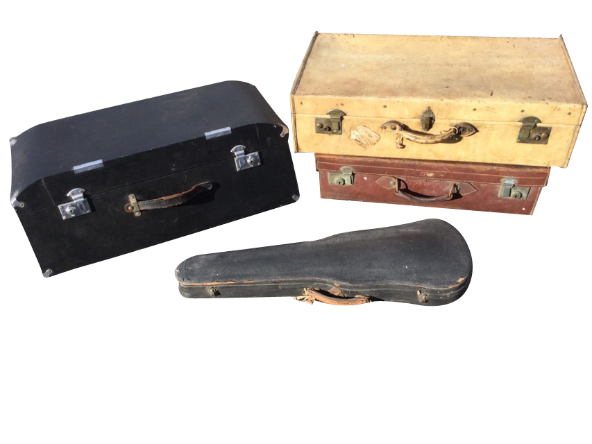 A shaped motoring trunk with chrome mounts and leather handle; a pigskin leather suitcase with brass