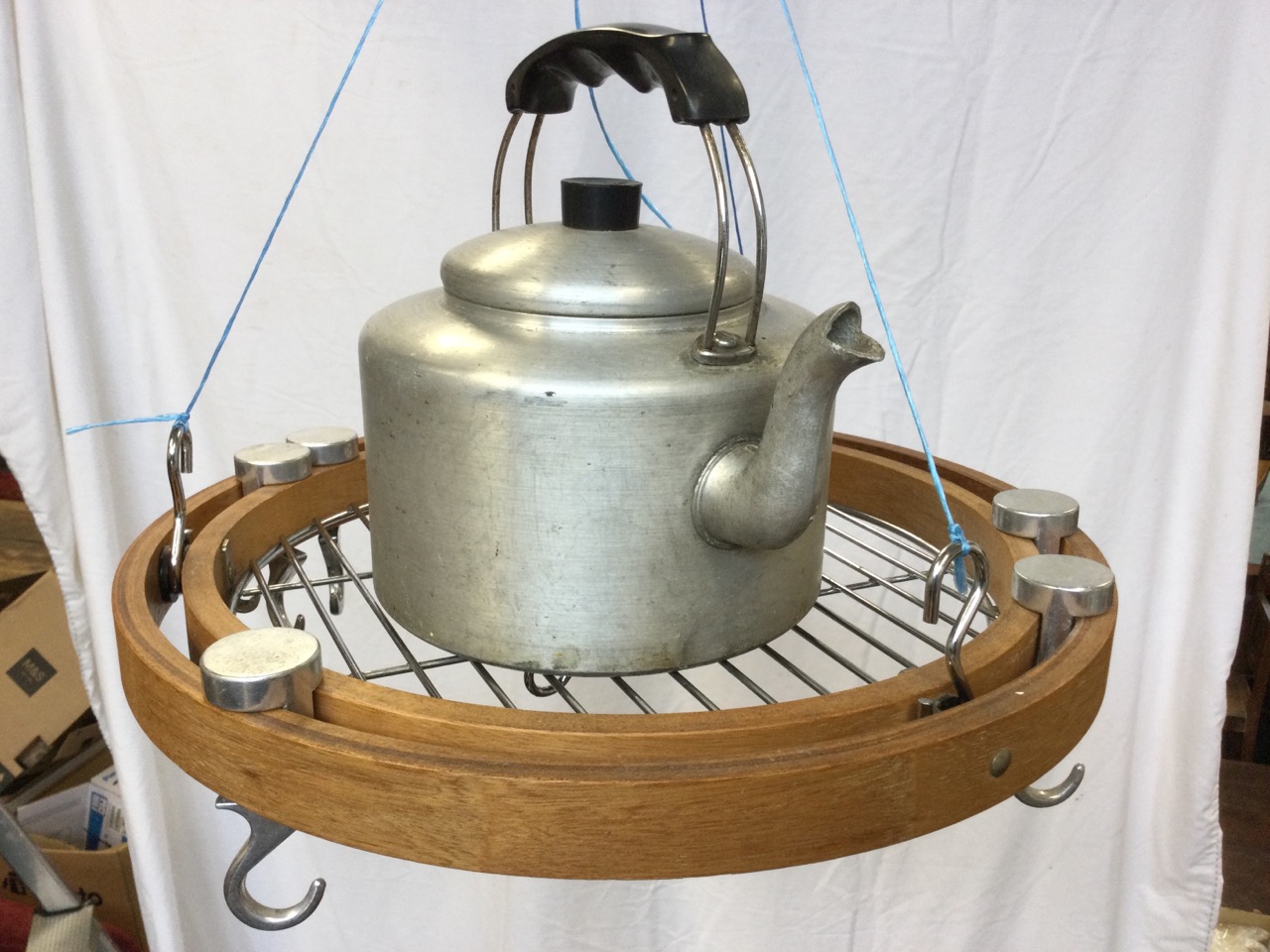 A contemporary kitchen utensil hanger with circular grill tray with revolving hooks; and an - Image 2 of 3